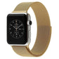 Gold milanese loop Apple Watch band with magnetic clasp on black watch