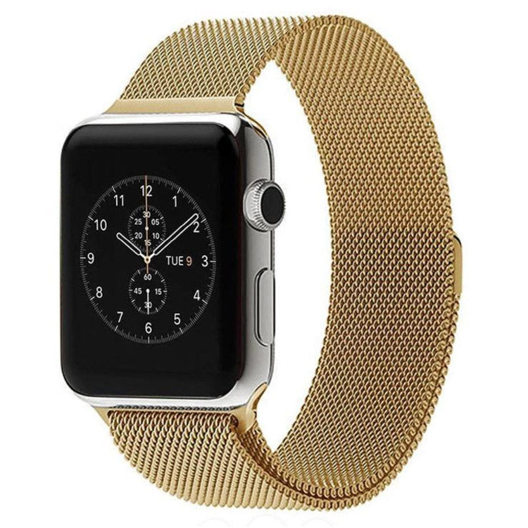 Gold milanese loop Apple Watch band with magnetic clasp on black watch