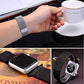 Magnetic Milanese loop watch band on wrist with silver watch case and strap detail
