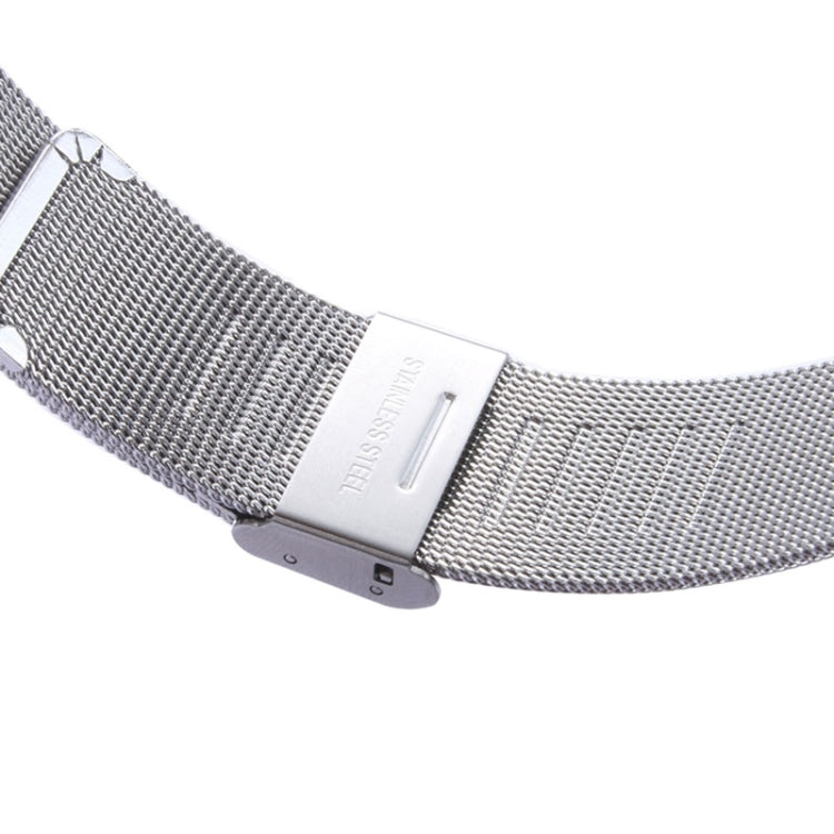 Close-up of silver Milanese watch band buckle with engraved clasp