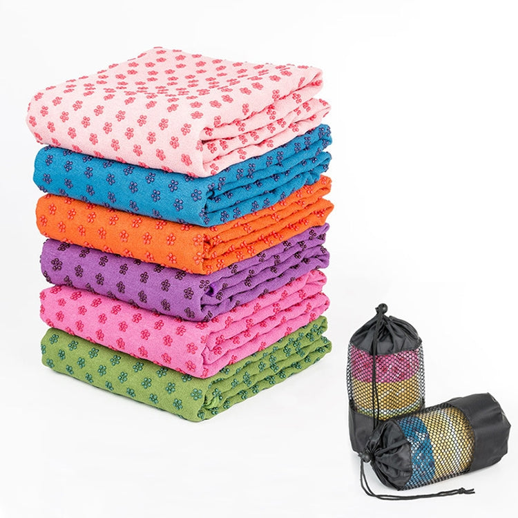 Microfiber yoga blanket mat, folded stack in mixed colors with small patterned design