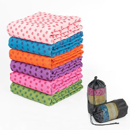 Microfiber yoga blanket mat, folded stack in mixed colors with small patterned design