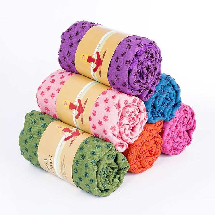 Folded microfiber yoga blankets with rolled shapes and assorted floral patterns, multicolor set