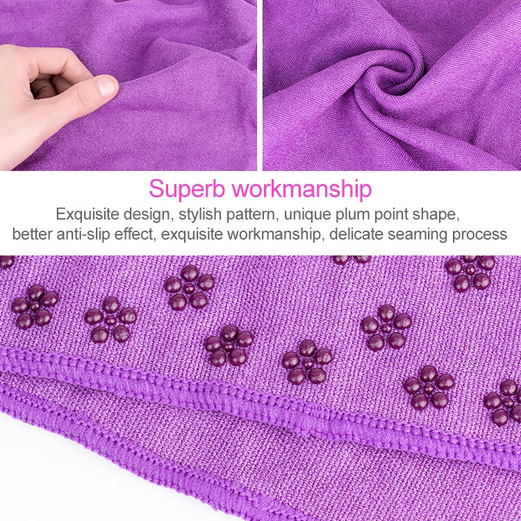 Purple microfiber yoga blanket fabric with visible stitching along the edge