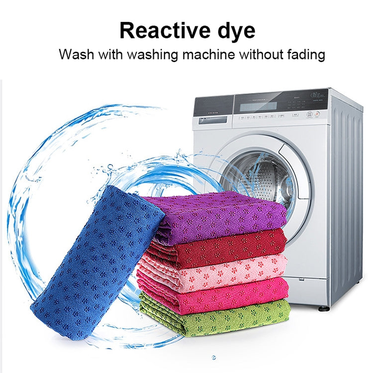 Layered microfiber yoga blankets rolled up in assorted colors