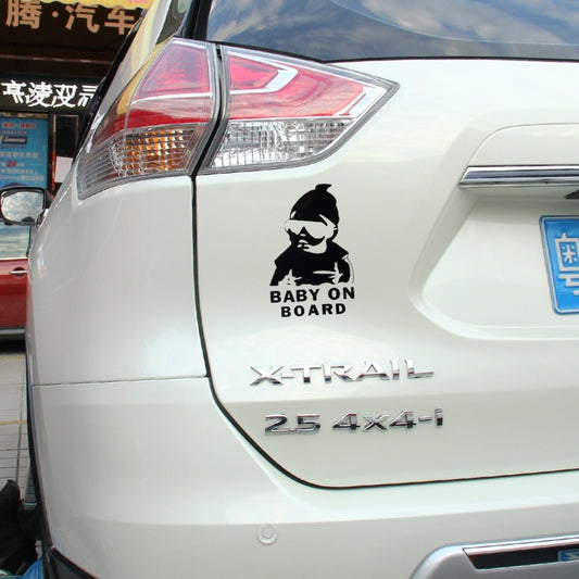 Black vinyl car sticker with baby silhouette and “BABY ON BOARD” on rear panel