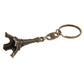 Bronze Eiffel Tower keychain with split ring and Paris charm, angled view