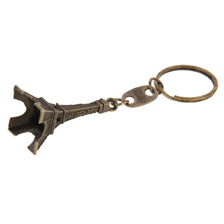 Bronze Eiffel Tower keychain with split ring and Paris charm, angled view
