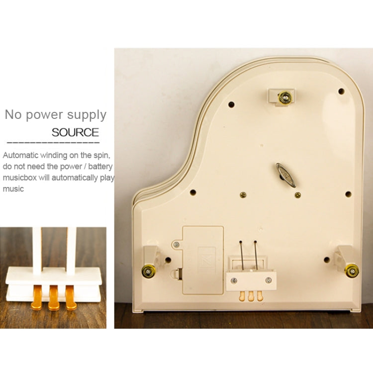White mechanical music box back panel with metal winding hardware and switches