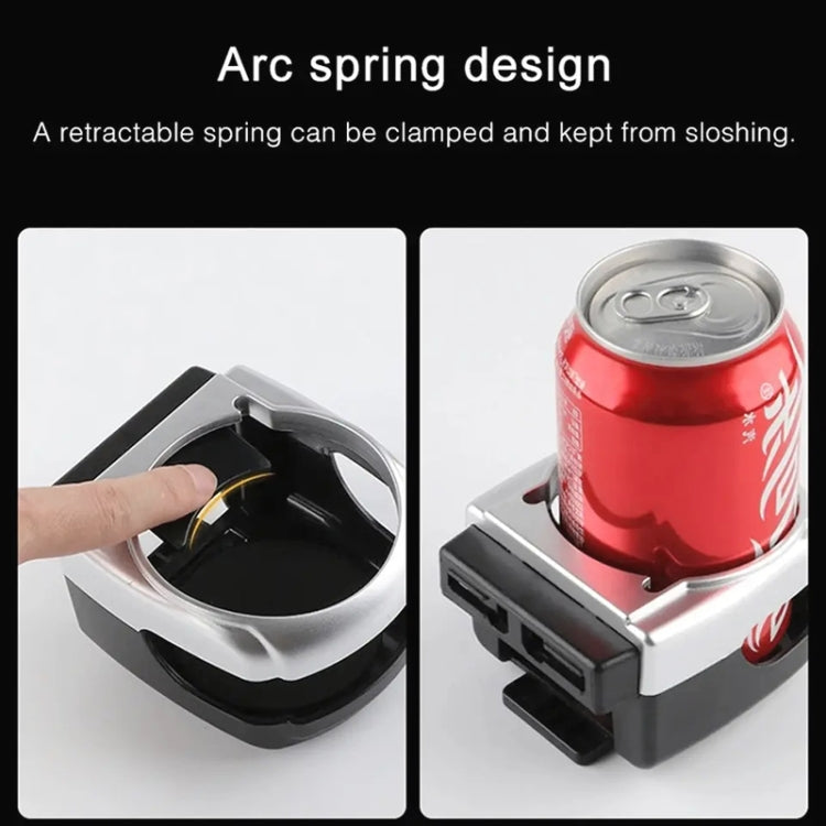 Red car outlet drink holder holding a can on the cushioned cradle with spring action