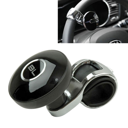 Black steering wheel spinner knob with chrome mounting base and BL button face