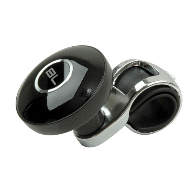 Black steering wheel spinner knob with chrome clamp-style mount and BL button face