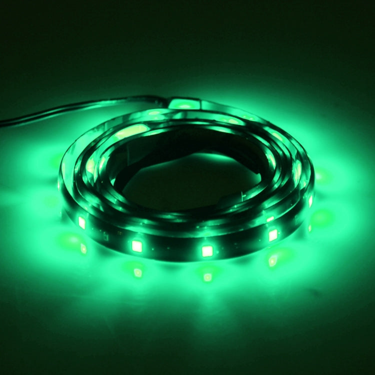 Flexible LED car strip lights with green glow, coiled 120cm strips with power leads