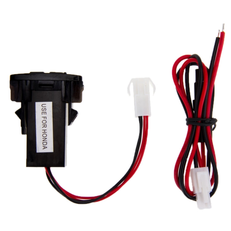 Black dual-port USB car charger adapter with white plug and red/black wire bundle
