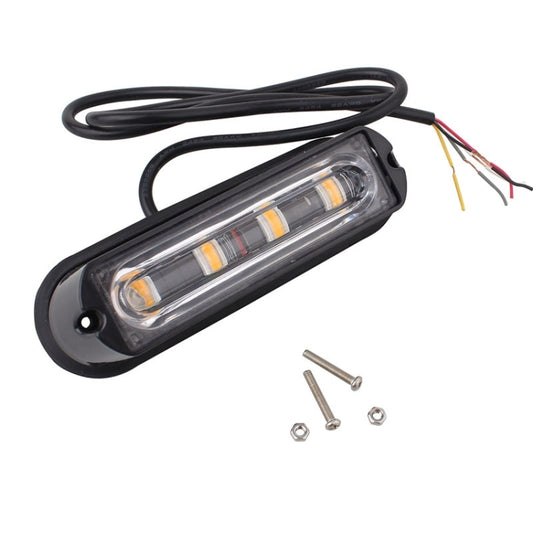 Car strobe warning light with clear lens, black base, wire leads and mounting hardware