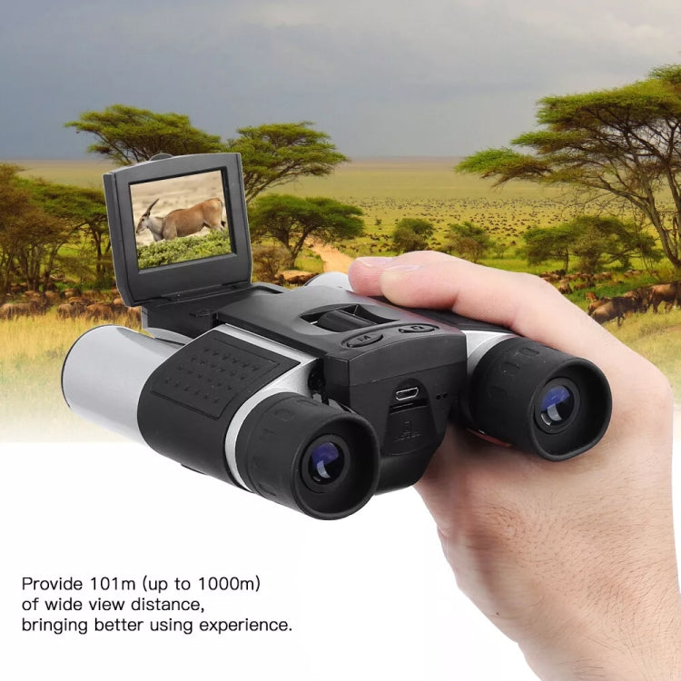 Handheld binocular digital telescope showing an image on the LCD screen