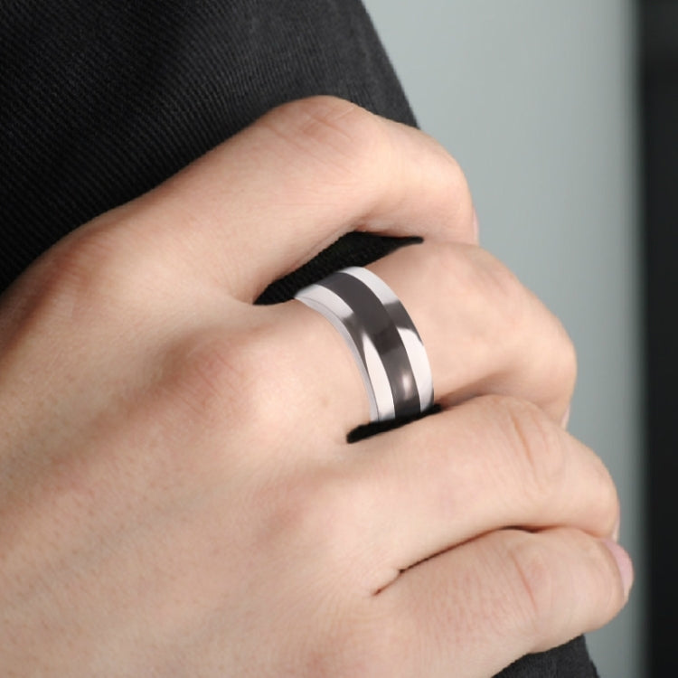 20mm magnetic metal ring worn on finger with dark stripe accent