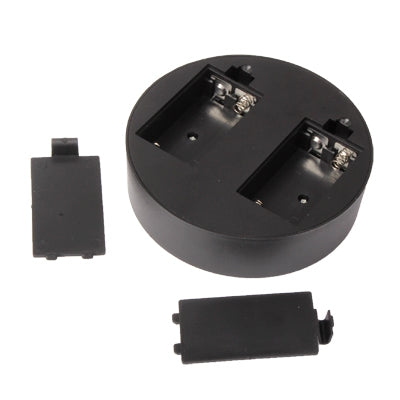 Kinetic orbital desk toy base with battery compartment and mounting clips