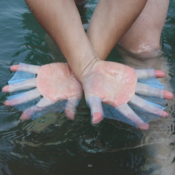 Silicone webbed hand flippers in water, translucent blue open-finger training gloves