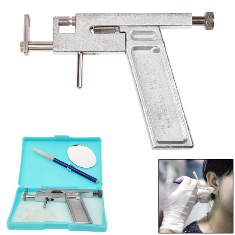 Ear piercing gun with turquoise case holding alignment pieces and mirror