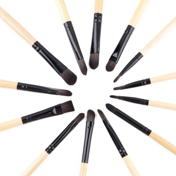 Cosmetic brush set display of multiple brushes with black ferrules and wooden handles