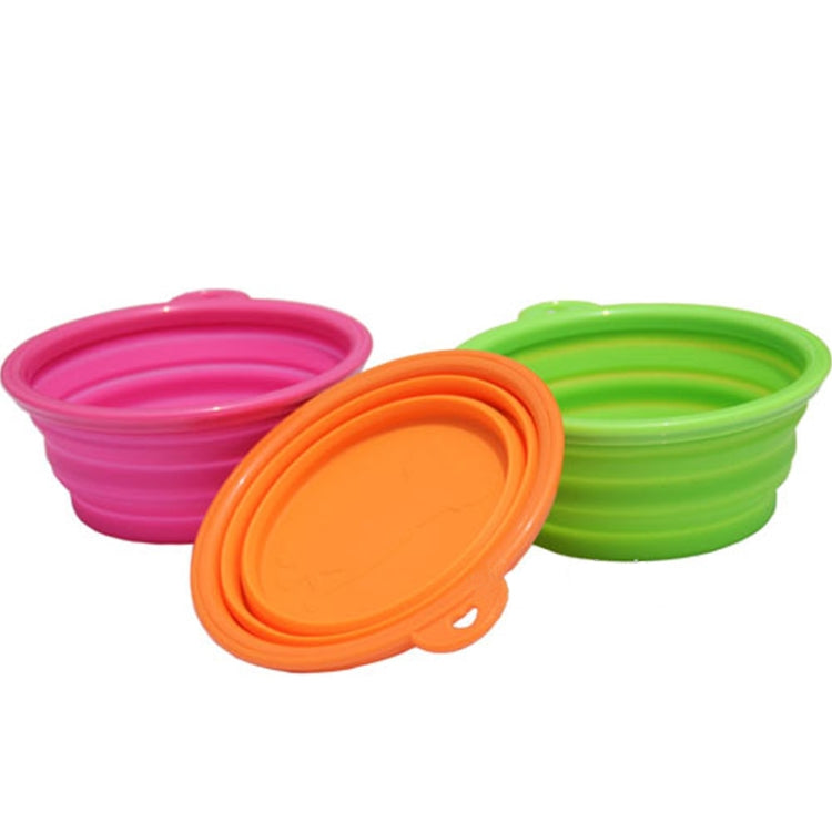 Collapsible silicone pet bowls in pink, orange, and green with hinged lids