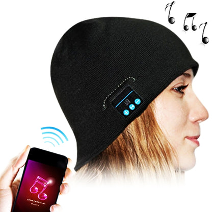 Black knit beanie with embedded Bluetooth control module on the side