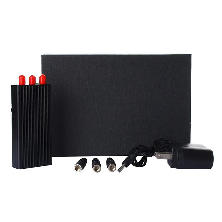 Compact signal jammer with antenna ports, power input plug, and bundled accessories.