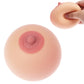 Breast-shaped soft stress toy with pink areola and nipple, hand squeezing top
