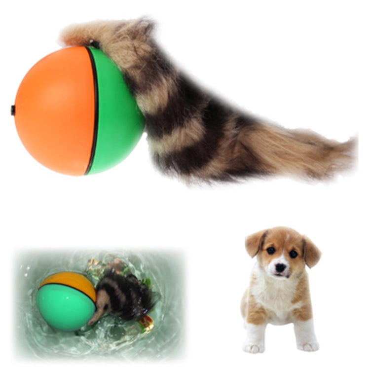 Motorized rolling chaser ball toy with orange and green shell and faux fur tail