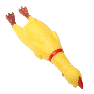 Yellow squishy screaming hen stress toy with red comb and feet, angled
