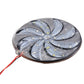 Close-up of round LED windmill light with silver LED blades and red leads