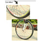 Bicycle wheel with reflective spoke strips, colorful light trail effect