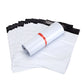 Stack of white padded mailing bags with air cushion wrap and red sealing band