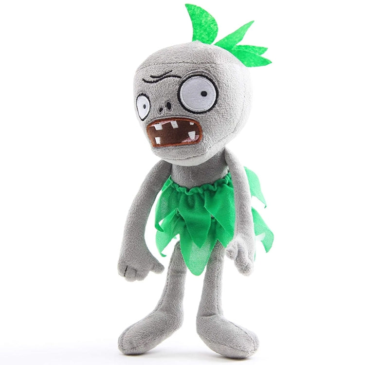 Plush zombie doll standing in green ragged dress with leaf-like head tuft