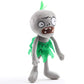 Plush zombie doll in standing pose, green ragged dress and leaf-like head tuft