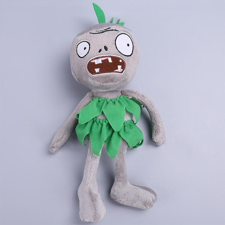 Plush zombie doll in green ragged dress with leaf-like head tuft and stitched face