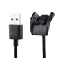 USB-A plug and black charging cradle contacts