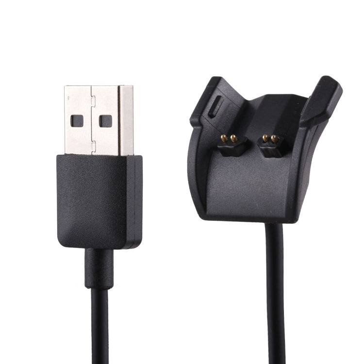 USB-A plug and black charging cradle contacts