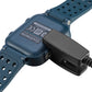 Blue Garmin smartwatch with black charging clip dock attached