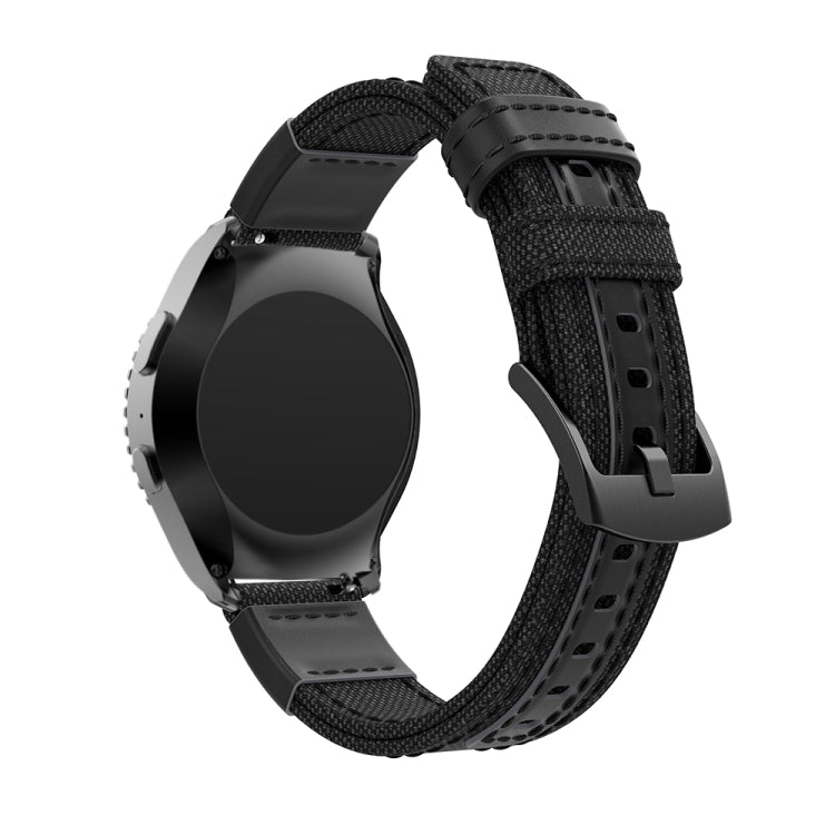 Smartwatch wrist strap showing black canvas band with looped keeper and perforated underside