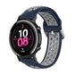 Silicone watch strap with buckle, navy blue exterior and gray perforated inner band