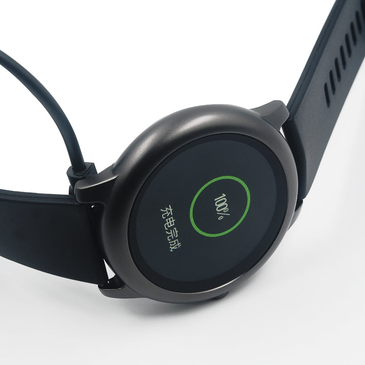 Magnetic watch charger puck with cable, dark gray round dock with green power icon