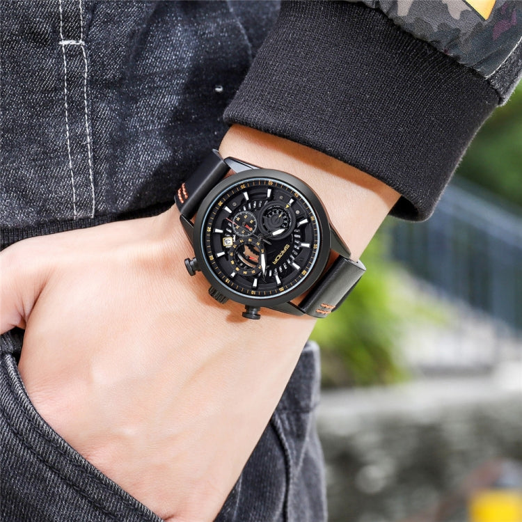 Men's leather strap chronograph watch on wrist, black case with orange-accent dial