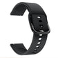 Black silicone smartwatch strap with metal buckle and perforated strap holes