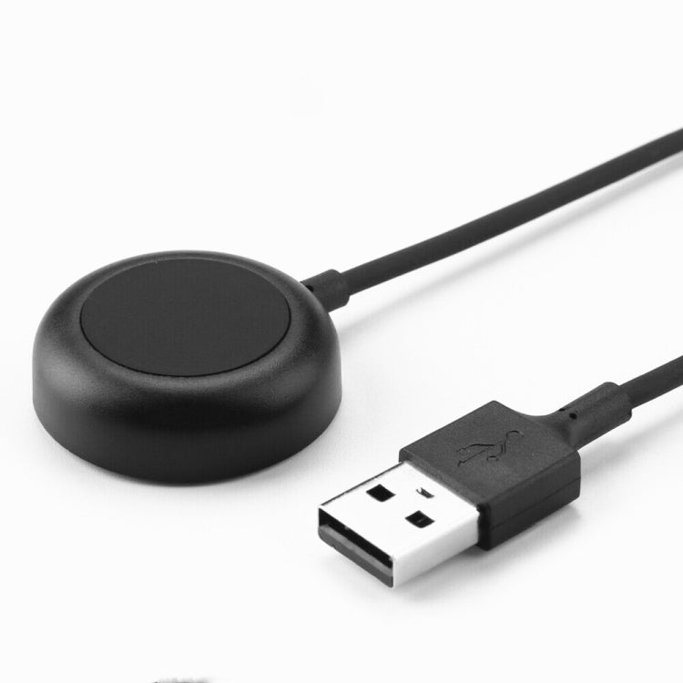 Round black magnetic charging dock with USB-A connector on short cable