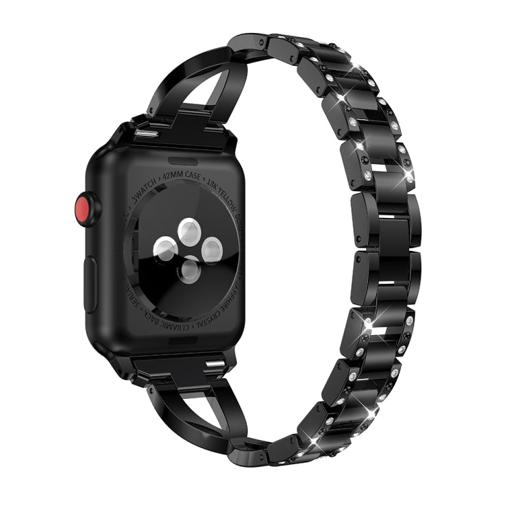 Black X-shaped diamond-studded stainless steel watch band on smartwatch, side view