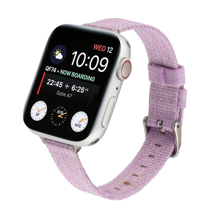 Lavender woven nylon watch strap with metal buckle and adjustable holes.