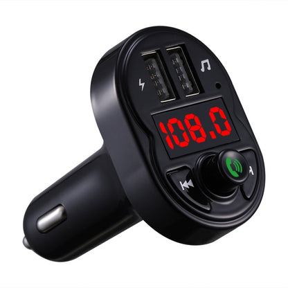 Black car FM handsfree kit with dual USB ports, red LED display, and call button
