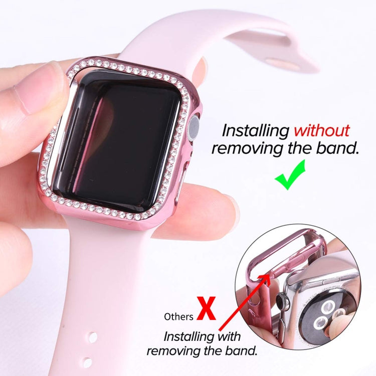 Pink watch case with rhinestone bezel and curved screen protector installed on wrist